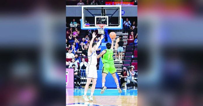 Far Eastern University Tamaraws’ L-Jay Gonzales converts the game-winning three-pointer against the Ateneo de Manila University Blue Eagles. UAAP PHOTO