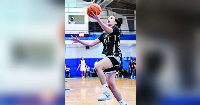 Negrense Kent Jane Pastrana of the University of Santo Tomas Growling Tigresses scores on a layup. UAAP PHOTO