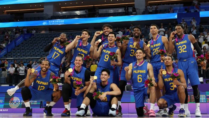 Gilas Pilipinas players celebrate their 2023 Asian Games basketball golden victory. The Philippines is Asiad men’s basketball champion again – its first since 1962. MARKO DJURICA/REUTERS