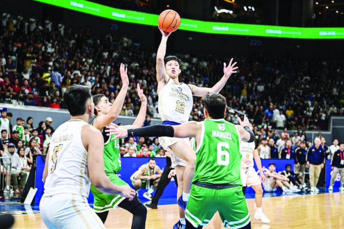 National University Bulldogs’ Patrick Wilson Yu goes for a floater. UAAP PHOTO