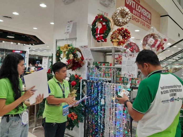 Personnel of the Department of Trade and Industry in Antique recently inspected establishments selling electric lights for the holidays. DTI-ANTIQUE FACEBOOK PAGE