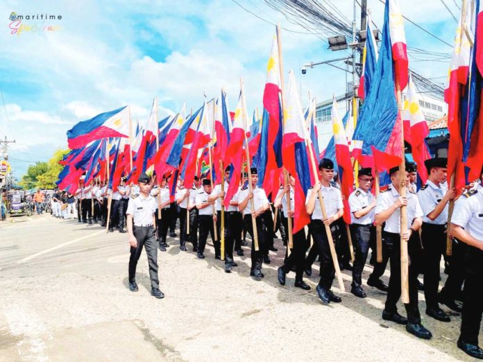 A parade of 125 flags added color to the commemoration of the 125th anniversary of the "Cry of Santa Barbara" in Santa Barbara, Iloilo on Nov. 17. The Iloilo Merchant Marine School mandaragats served as flag bearers. MARITIME SPECTRUM - ILOILO MERCHANT MARINE SCHOOL FB PHOTO