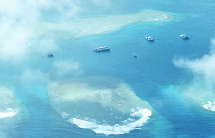 Philippine Coast Guard’s air patrol spots Chinese vessels in the waters around Ayungin Shoal, following the Feb. 6, 2023, laser “attack” on a PCG vessel in the area. PHILIPPINE DAILY INQUIRER/NIÑO JESUS ORBETA