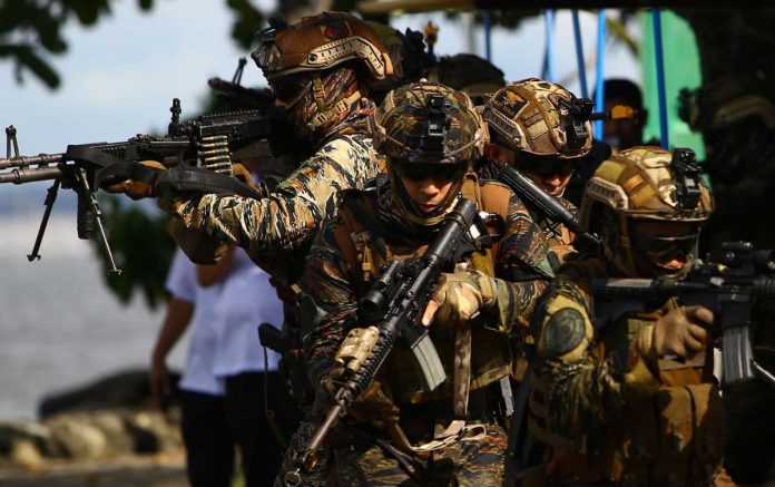 The Naval Special Operations Command conducts capability demonstrations during its 67th founding anniversary celebration at Naval Base Heracleo Alano in Sangley Point, Cavite on Monday, Nov. 6, 2023. President Ferdinand R. Marcos Jr. praised the Philippine Navy elite unit for its performance, particularly through extensive counter-terrorism training and operations, including rescue missions which, he said, greatly support internal security efforts, especially in southern Philippines. PNA