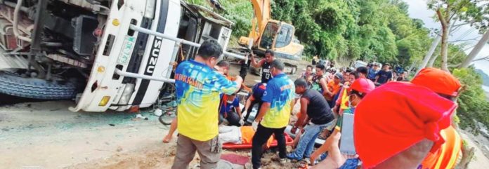 Personnel of the Tobias Fornier Fire Station and Municipal Disaster Risk Reduction and Management Office and the town’s police officers respond to a vehicular accident involving a delivery truck in Barangay Igdalaguit on Tuesday, Nov. 21. TOBIAS FORNIER FIRE STATION PHOTO