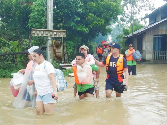 Authorities conducted evacuation in Sitio Mait, Barangay Sto. Angel, Dumalag, Capiz on Monday, Nov. 20, due to rising floodwaters amid heavy rains. MDRRMO DUMALAG, CAPIZ FB PHOTO