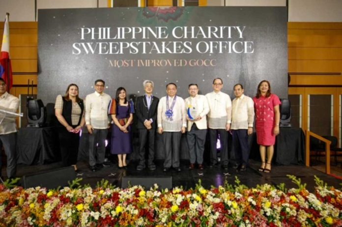 (From L to R) PCSO Director Jennifer Liongson-Guevara; GCG Commissioner Atty. Brian Keith Hosaka; GCG Commissioner Atty. Geraldine Marie Berberabe-Martinez; PCSO Chairman Junie Cua; Executive Sec. Lucas Bersamin; PCSO General Manager Melquiades Robles; GCG Chairperson Atty. Marius Corpus; PCSO Director Judge Felix Reyes (Ret); and Director Janet De Leon-Mercado during the GCG Governance Awards in PICC, Pasay City on Nov. 20, 2023.