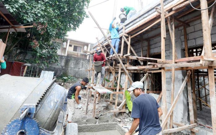 The modified rate of import duty on national gypsum and anhydrite would support the housing and infrastructure projects in the Philippines. Photo shows the construction of a residential structure in Quezon City. PNA PHOTO BY OLIVER MARQUEZ