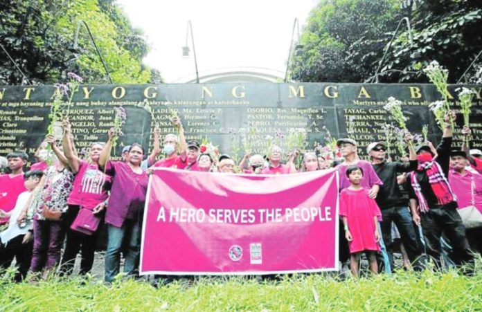 Human rights activists and survivors of martial law atrocities gather on Saturday at the Bantayog ng mga Bayani in Quezon City to express their continuing condemnation of the hero’s burial accorded to the late dictator by then President Rodrigo Duterte in 2016. PHOTO BY LYN RILLON / PHILIPPINE DAILY INQUIRER