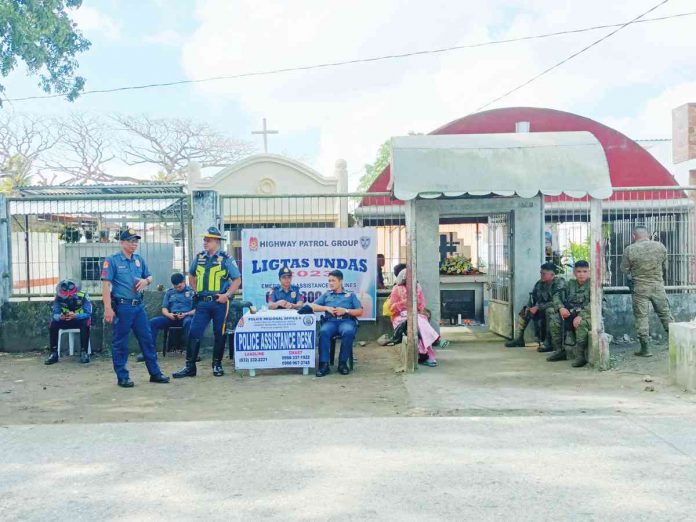 Security forces successfully maintained peace during the All Saints’ and All Souls’ days in Western Visayas, with police assistance desks set up across the region, such as the one at the municipal cemetery in Leganes, Iloilo. AJ PALCULLO/PN