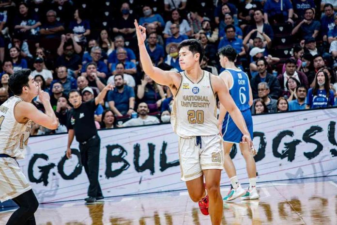 National University Bulldogs’ Jake Figueroa gestures after scoring a three-pointer against Ateneo de Manila University Blue Eagles. UAAP PHOTO