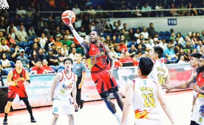 San Miguel Beermen’s Jaymar Perez stretches for a layup. PBA PHOTO