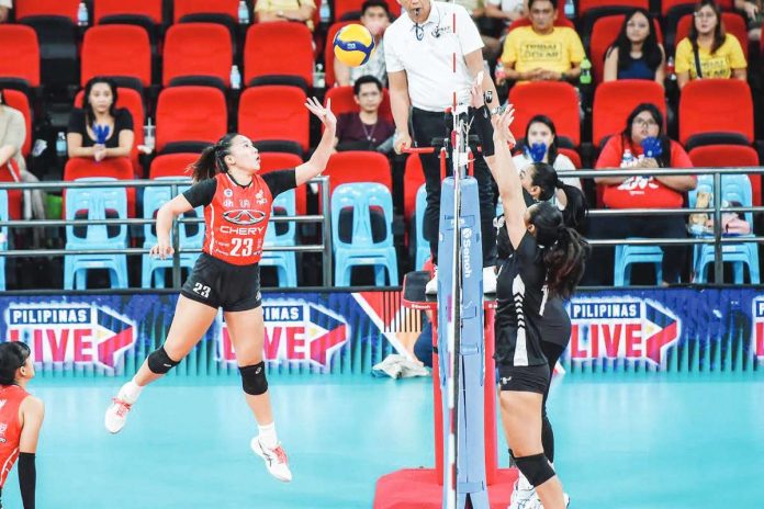 Ilongga Ma. Shaya Adorador of Chery Tiggo Crossovers attempts to push the ball to the side of Petro Gazz Angels. PVL PHOTO