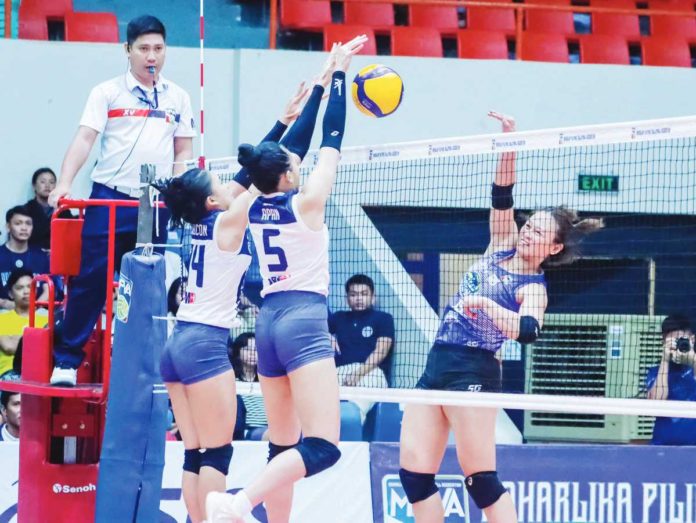 Ilongga Shannen Palec of Marikina Lady Shoemasters had her shot blocked by the defense of Negros ICC Blue Hawks. MPVA PHOTO