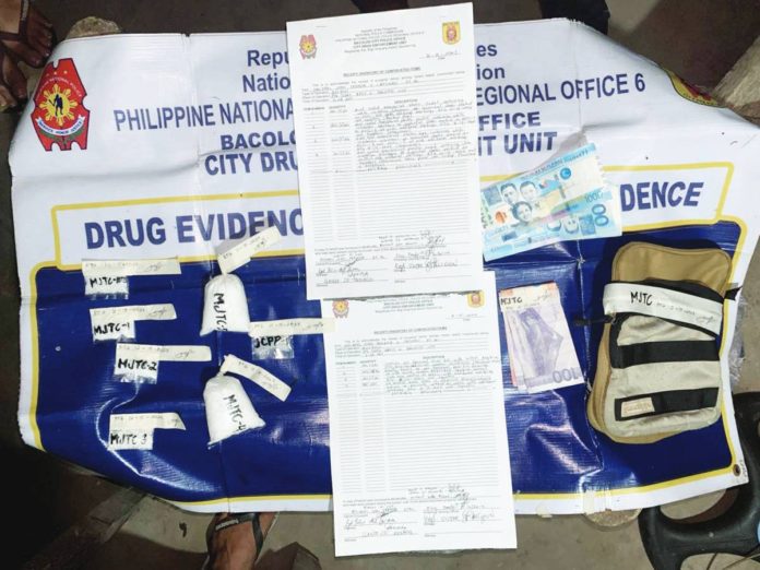 The Police Regional Office 6 seized 7,202 grams of suspected shabu from Dec. 11 to 17. Photo shows a police operation in Bacolod City on Dec. 15 where the City Drug Enforcement Unit seized P1.57 million worth of suspected shabu. PRO-6 PHOTO