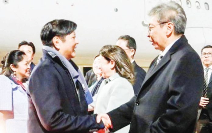 President Ferdinand R. Marcos Jr. (left) and party land at Haneda International Airport in Tokyo, Japan on Friday night, Dec. 15. He will participate in the 50th Commemorative ASEAN-Japan Friendship and Cooperation Summit. PHOTO COURTESY OF PCO