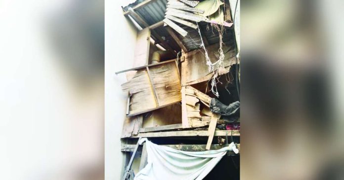 The shack owned by siblings Willie and Stephen Oraño, arrested during an antidrug operation on Monday, was demolished by barangay authorities. BARANGAY CAPTAIN JENNIFER QUISTO VIA AKSYON RADYO