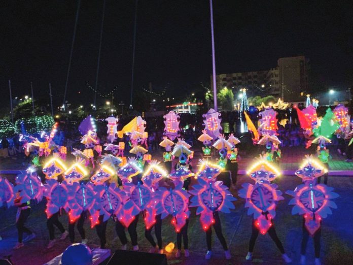 Students from STI-West Negros University during the Festival of Lights arena dance competition at the Bacolod City Government Center grounds on Dec. 2. BCD PIO