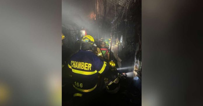 Fire volunteers put out the blaze that gutted houses in Barangay 1, Bacolod City on Dec. 23. CHAMBER VOLUNTEER FIRE BRIGADE/FACEBOOK