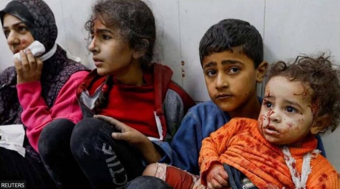 Young children take shelter inside Nasser hospital in Khan Younis, Gaza Strip. REUTERS