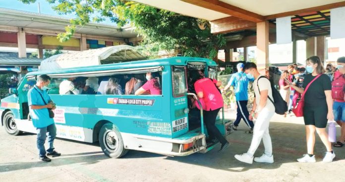 The jeepney, such as this one at the Tagbak terminal in Jaro, Iloilo City, started as remodeled army vehicles left behind by US forces after World War II, and quickly became the core of Philippine public transport. But most jeepneys are not compliant with smoke emission and safety standards. The government’s transport modernization program aims to address this.