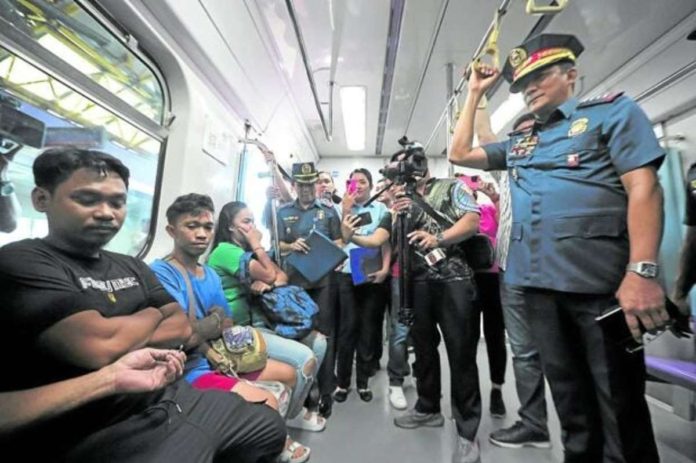 Philippine National Police chief Gen. Benjamin Acorda Jr. takes a train ride to Quiapo after inspecting the Araneta-Cubao station of LRT 2 on Tuesday. Security has been increased in Metro Manila after Sunday’s terror attack in Marawi City. GRIG C. MONTEGRANDE, PHILIPPINE DAILY INQUIRER