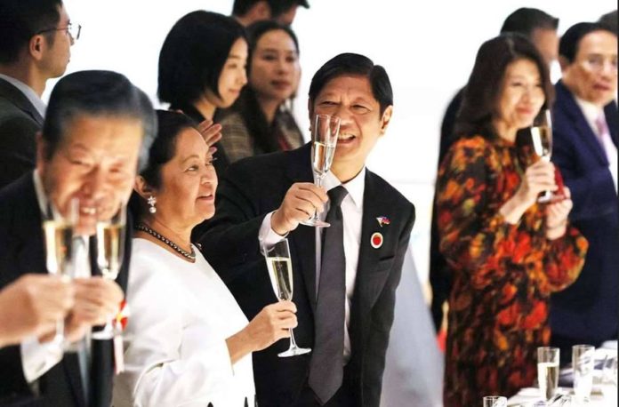 President Ferdinand Marcos Jr. (center), accompanied by his wife Louise Araneta (2nd from left), toasts at the gala dinner for the 50th anniversary event between ASEAN and Japan as part of the ASEAN-Japan commemorative summit in Tokyo, Japan on Dec. 17. YOSHIKAZU TSUNO, EPA-EFE