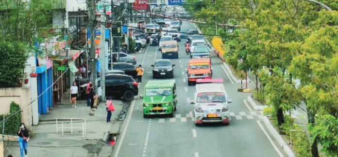 The Land Transportation Franchising and Regulatory Board Region 6 says 2,509 units of public utility jeepneys (PUJs) in Western Visayas require consolidation. Photo shows several traditional PUJs traversing along Gen. Luna Street in Iloilo City. AJ PALCULLO/PN