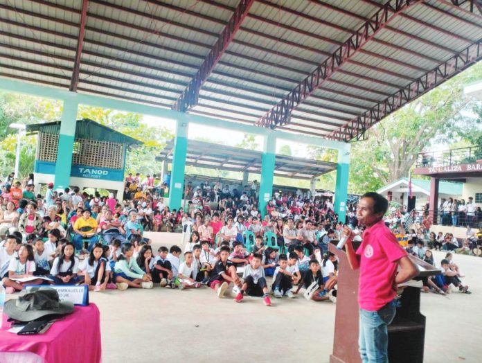 Residents and officials of Barangay Tambaliza, Concepcion, Iloilo attend the public hearing on mining exploration on Pan de Azucar Island on Wednesday, Nov. 29. DYRI RMN ILOILO PHOTO