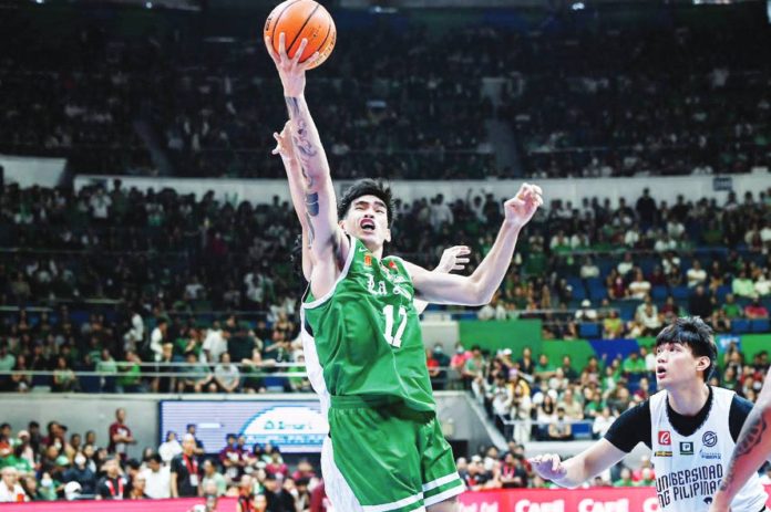 De La Salle University Green Archers’ Kevin Quiambao stretches for a layup during Game 3 of their UAAP Season 86 men’s basketball finals series against University of the Philippines Fighting Maroons. UAAP PHOTO