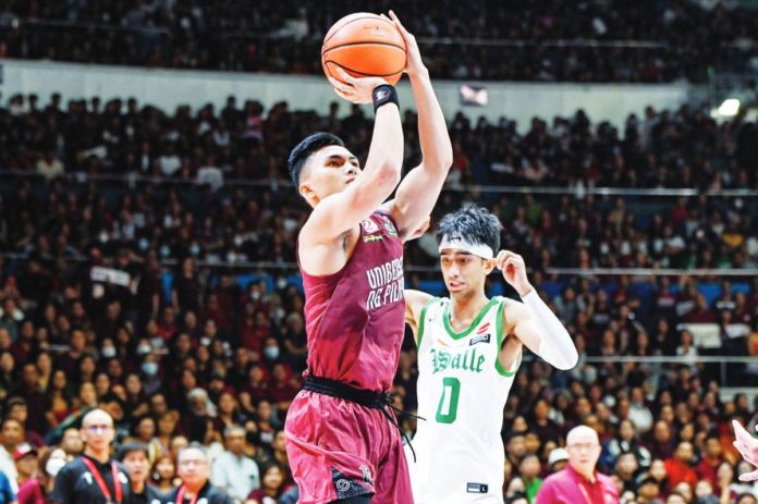 Negrense Harold Alarcon of University of the Philippines Fighting Maroons attempts a basket during Game 2 of their UAAP Season 86 men's basketball finals series against De La Salle University Green Archers on Sunday. UAAP PHOTO