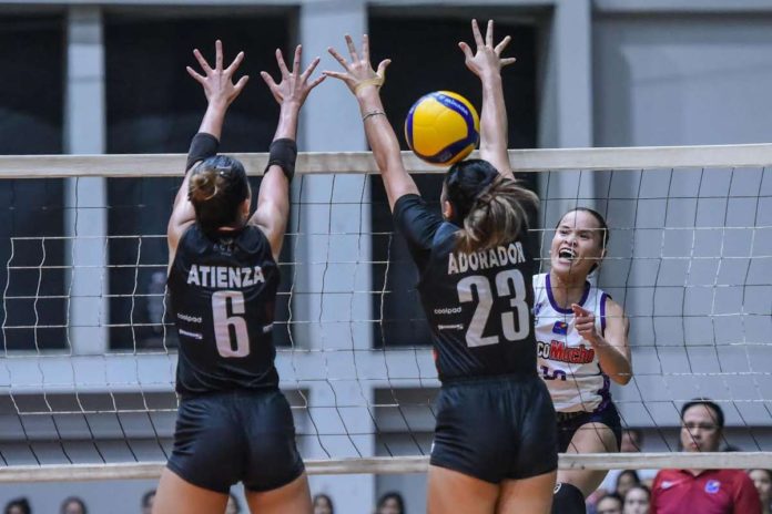 Choco Mucho Flying Titans’ Cherry Ann Rondina smashes the ball to the defense of Ilongga Ma. Shaya Adorador of Chery Tiggo Crossovers. PVL PHOTO