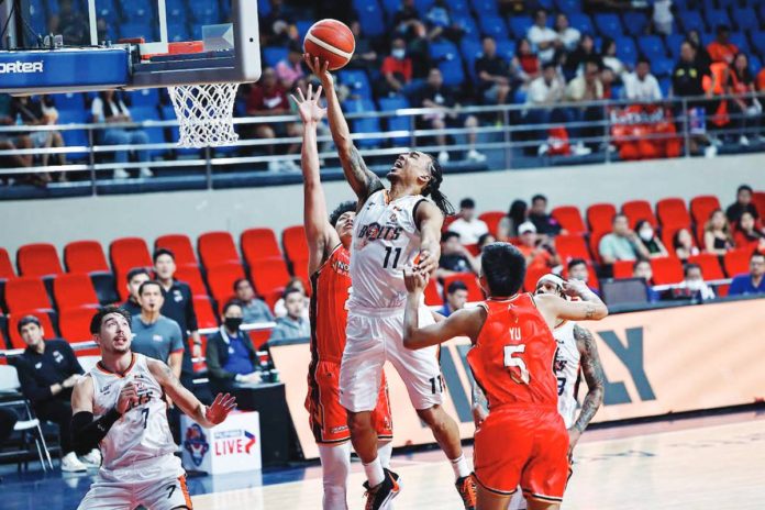 Chris Newsome delivers clutch baskets for Meralco Bolts in their overtime win against Ryukyu Golden Kings. PBA PHOTO