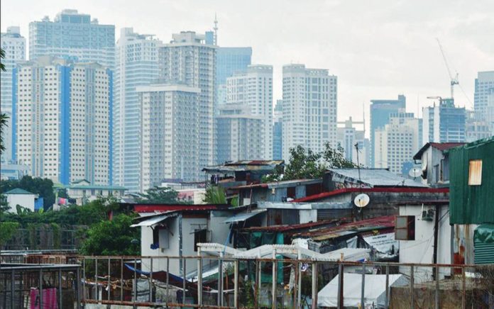 The Philippines’ investment rate ramped up over the last seven years but it is well below that of its neighboring countries even, according to the World Bank. Photo shows the Makati skyline behind a residential area in Pasay City. MARK DEMAYO, ABS-CBN NEWS/FILE PHOTO