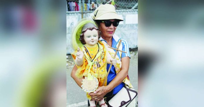 Celeste Tiokson from Camarines Sur embarked on a heartfelt pilgrimage to Iloilo City to pray for the recovery of a loved one undergoing dialysis. AJ PALCULLO/PN