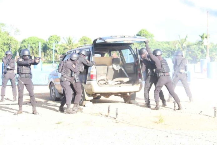 The Special Weapons and Tactics team of Passi City performs a simulation drill during their training closing ceremony. LGU PASSI CITY/FACEBOOK