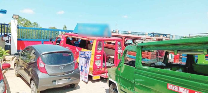 Traditional public utility jeepney operators in Bacolod City blocked the main gate of the Land Transportation Office (LTO) as part of their ongoing protest over the modernization program. DGB/WATCHMEN DAILY JOURNAL