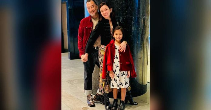 Beauty Gonzalez (center) with husband Norman Crisologo and daughter Olivia