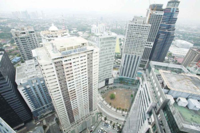 The skyline of a business district is seen from a commercial building in Ortigas, Pasig city, Metro Manila. REUTERS/ROMEO RANOCO/FILE PHOTO