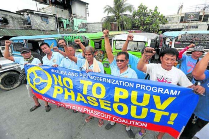 Jeepney drivers in Pasig City protest against the government’s public utility vehicle modernization program, saying it would hurt them and their livelihood. NIÑO JESUS ORBETA, INQUIRER.NET