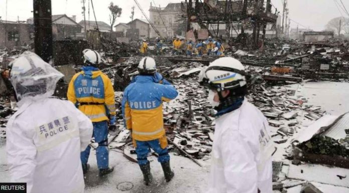 Snow and heavy rain has been hampering the search for those still missing following the earthquake in Japan. REUTERS