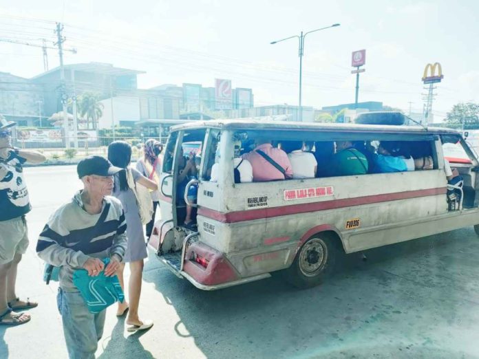 “First town” jeepneys such as this one from Pavia, Iloilo can continue serving their Iloilo City routes, according to the Traffic Management Unit. PN PHOTO