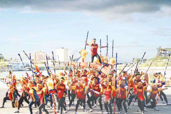 Dancers of New Lucena, Iloilo’s Cry of Jelicuon Festival perform during the opening salvo of the Kasadyahan sa Kabanwahanan 2024 at the Iloilo Freedom Grandstand in Iloilo City on Friday, Jan. 5. AJ PALCULLO/PN