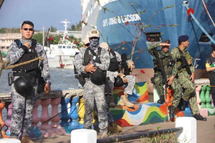 Hundreds of cops from the Iloilo Police Provincial Office will be deployed in Iloilo City during the Dinagyang Festival. Photo shows police and coast guard personnel securing Friday’s opening salvo. ILOILO CITY MAYOR’S OFFICE PHOTO