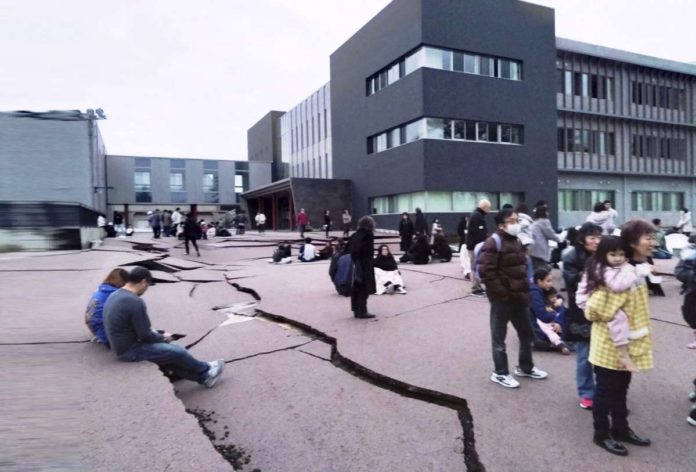 Road cracks caused by an earthquake is seen in Wajima, Ishikawa prefecture, Japan on Jan. 1, 2024, in this photo released by Kyodo. REUTERS