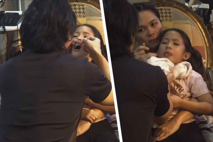 Ryan Agoncillo removes his daughter Luna's baby tooth. SCREENSHOTS FROM RYAN AGONCILLO’S INSTAGRAM REEL