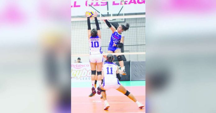 Ilongga Ana Franchessca Hermosura of Bacolod Tay Tung High School Thunderbolts smashes the ball against the defense. PHOTO COURTESY OF LIFE’S A SPORT FACEBOOK PAGE