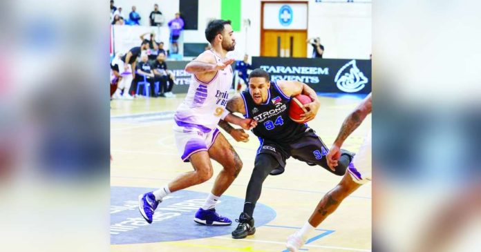 Strong Group Athletics-Philippines' McKenzie Moore creates separation from his Beirut Sports Club defender. PHOTO COURTESY OF UAE BASKETBALL ASSOCIATION