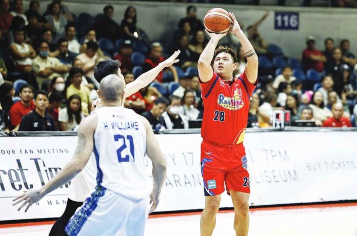 Rain or Shine Elasto Painters’ Beau Belga attempts a shot against the defense of TNT Tropang Giga’s Calvin Oftana. PBA PHOTO