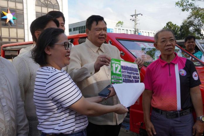 The Iloilo City Government headed by Mayor Jerry P. Treñas led the “ceremonial stickering” of consolidated public utility vehicles on Dec. 30 at Plaza Libertad. ILOILO CITY GOVERNMENT PHOTO